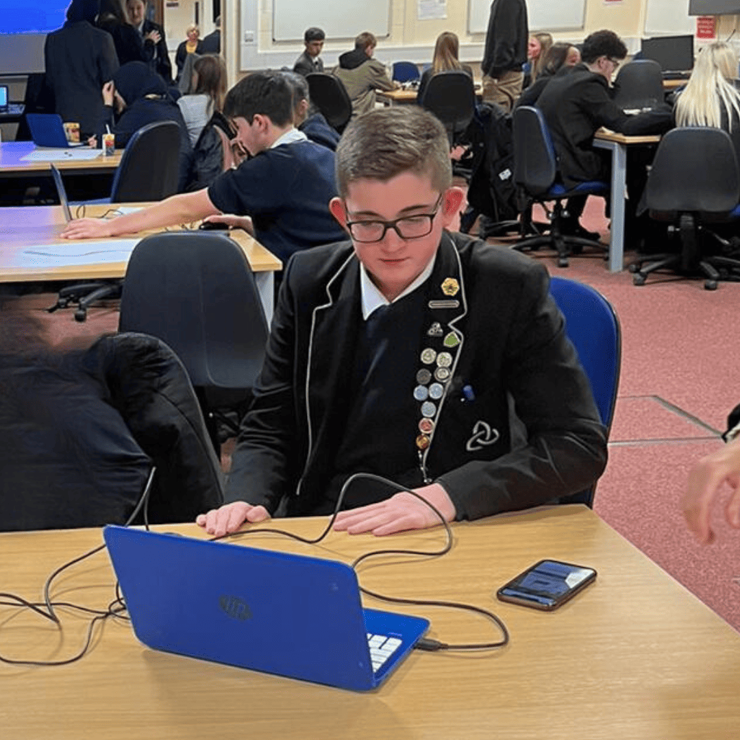 A Laurus Ryecroft student works on a challenge at the North West STEM Challenge final at University of Manchester 2024.