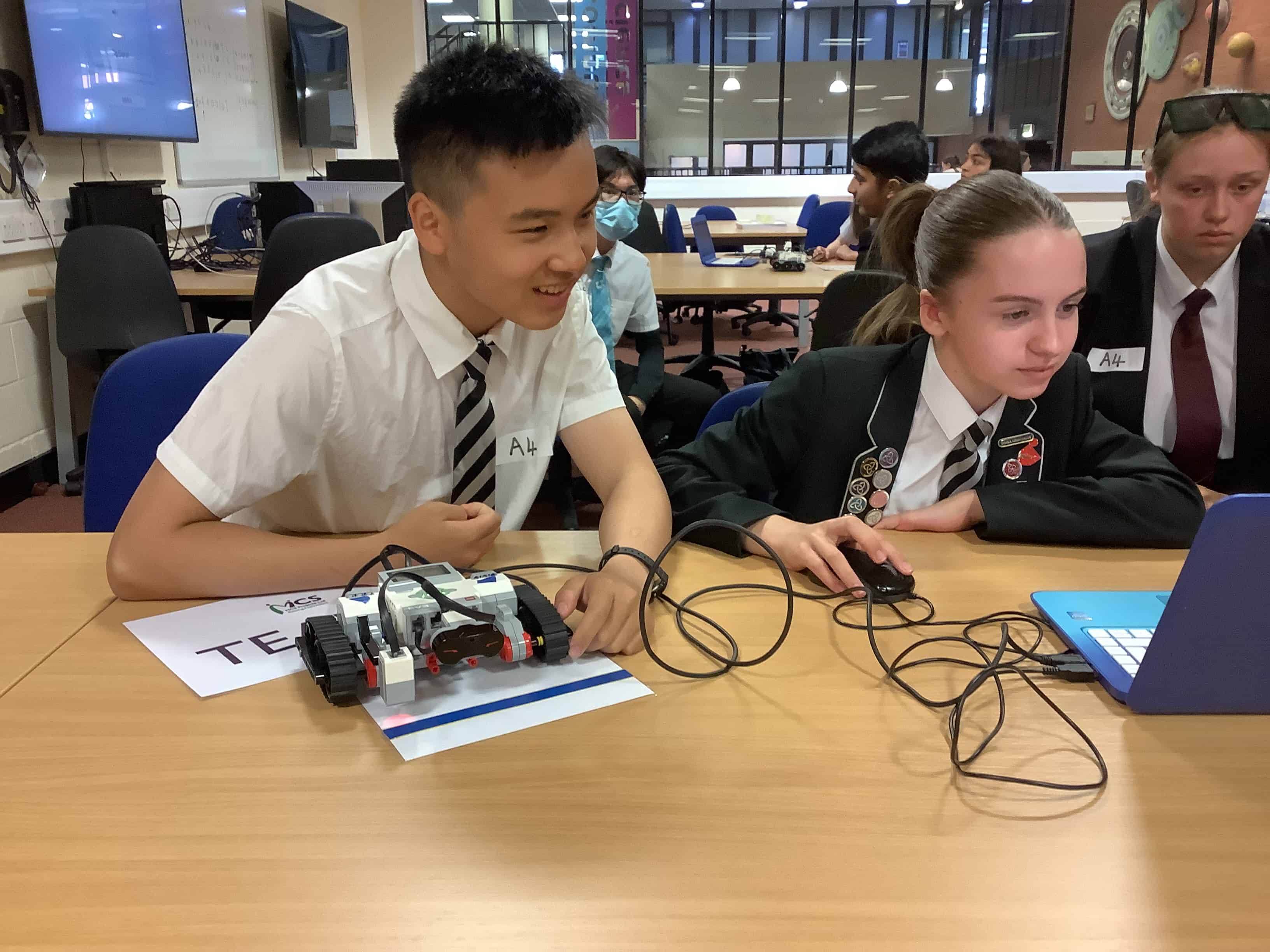 Laurus Ryecroft students programme a robot as part of the MCS Science and Technology challenge during Super Science Week.