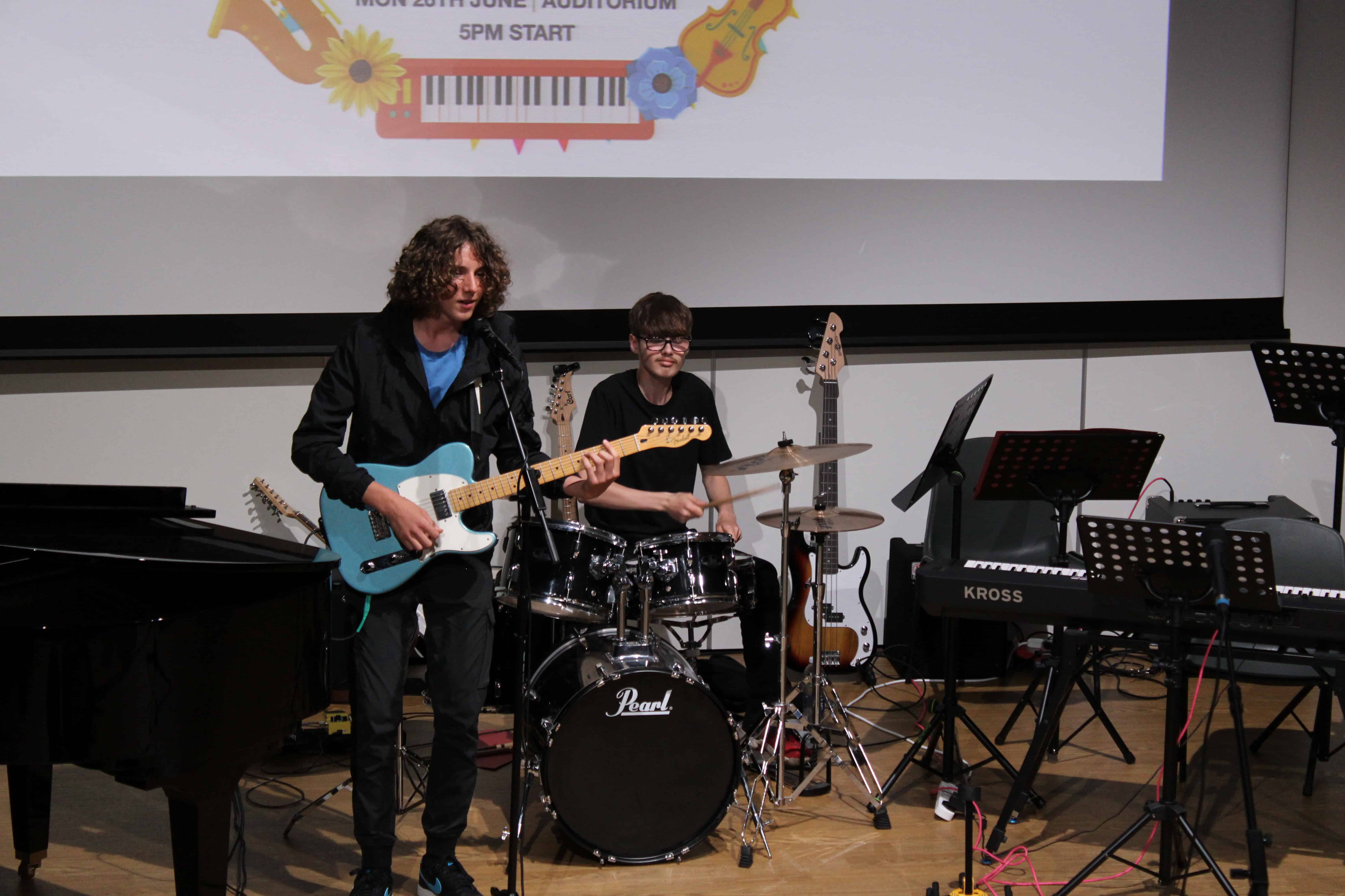 Alex Spencer and Oscar performing together in the Laurus Ryecroft Summer Sounds Concert 2023.