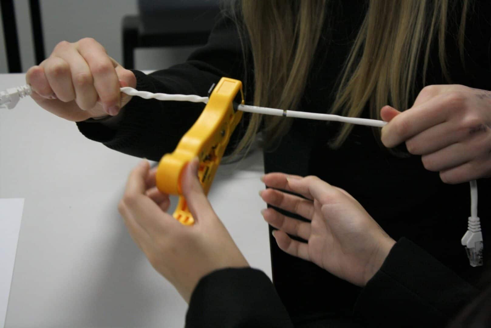 students tap into communications with cable cutters
