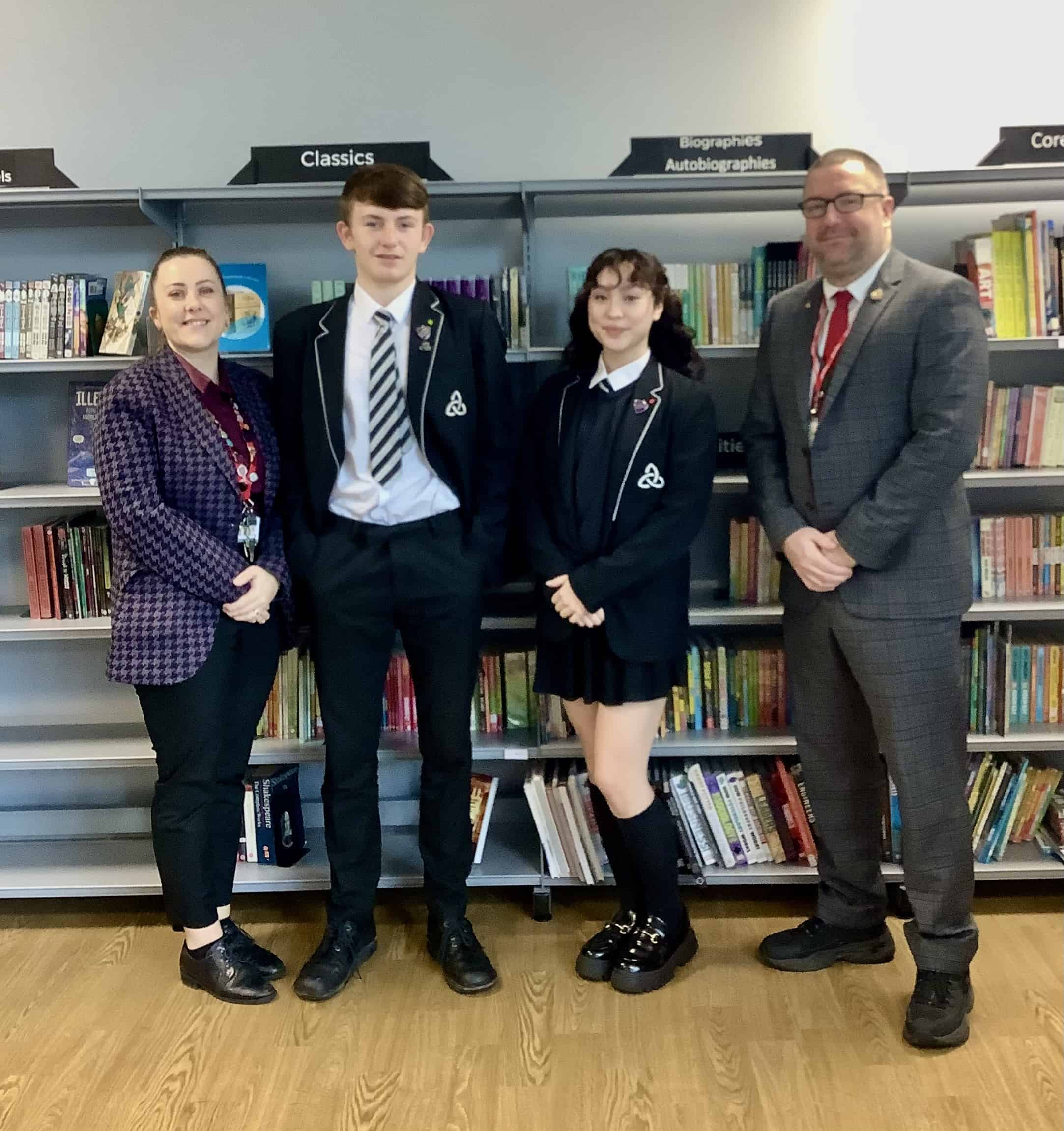 A teacher stands next to two student leaders from Laurus Ryecroft and David Mills, Councillor for Droylsden East