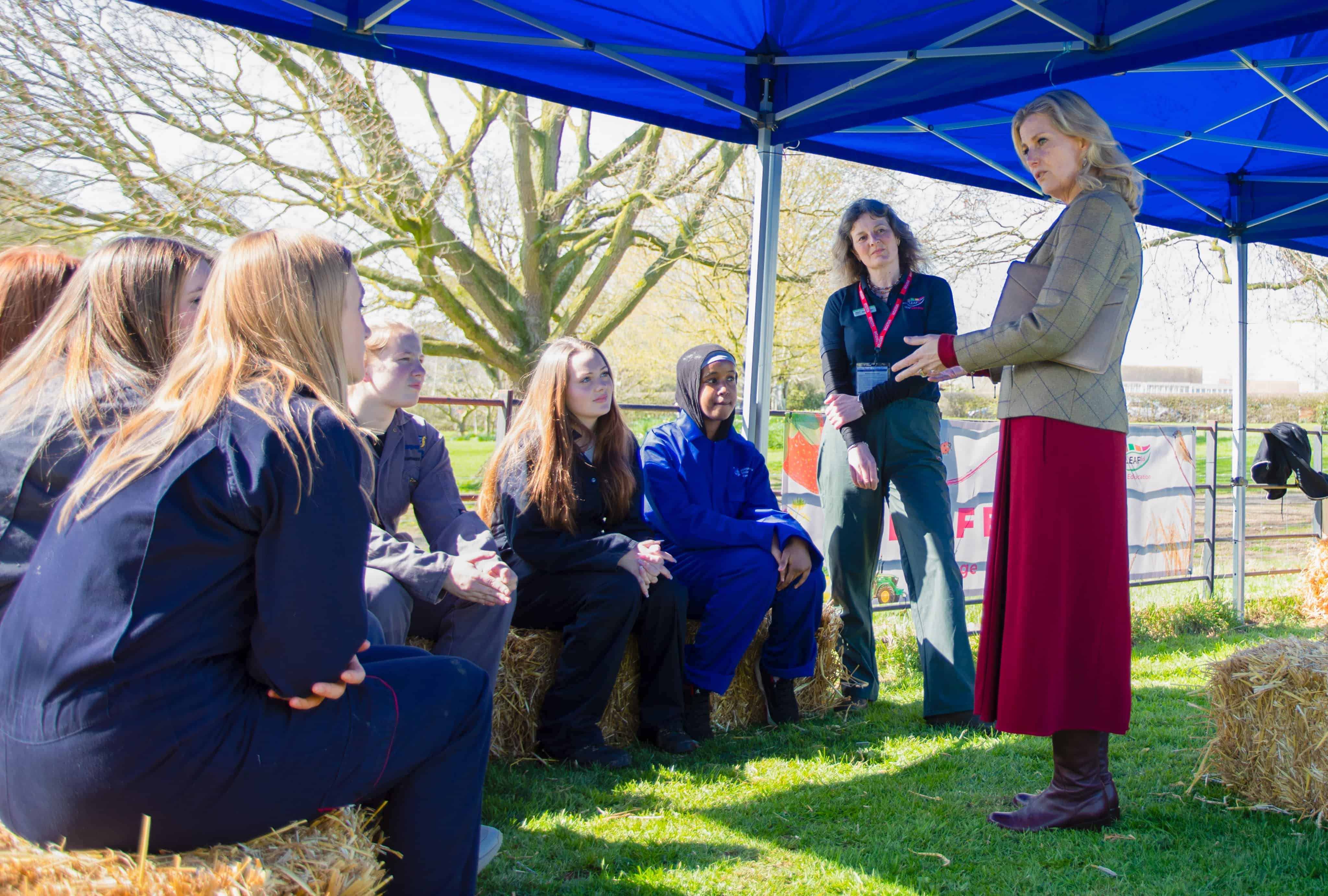 Laurus Ryecroft students sit and talk to the Duchess of Edinburgh about sustainable agriculture