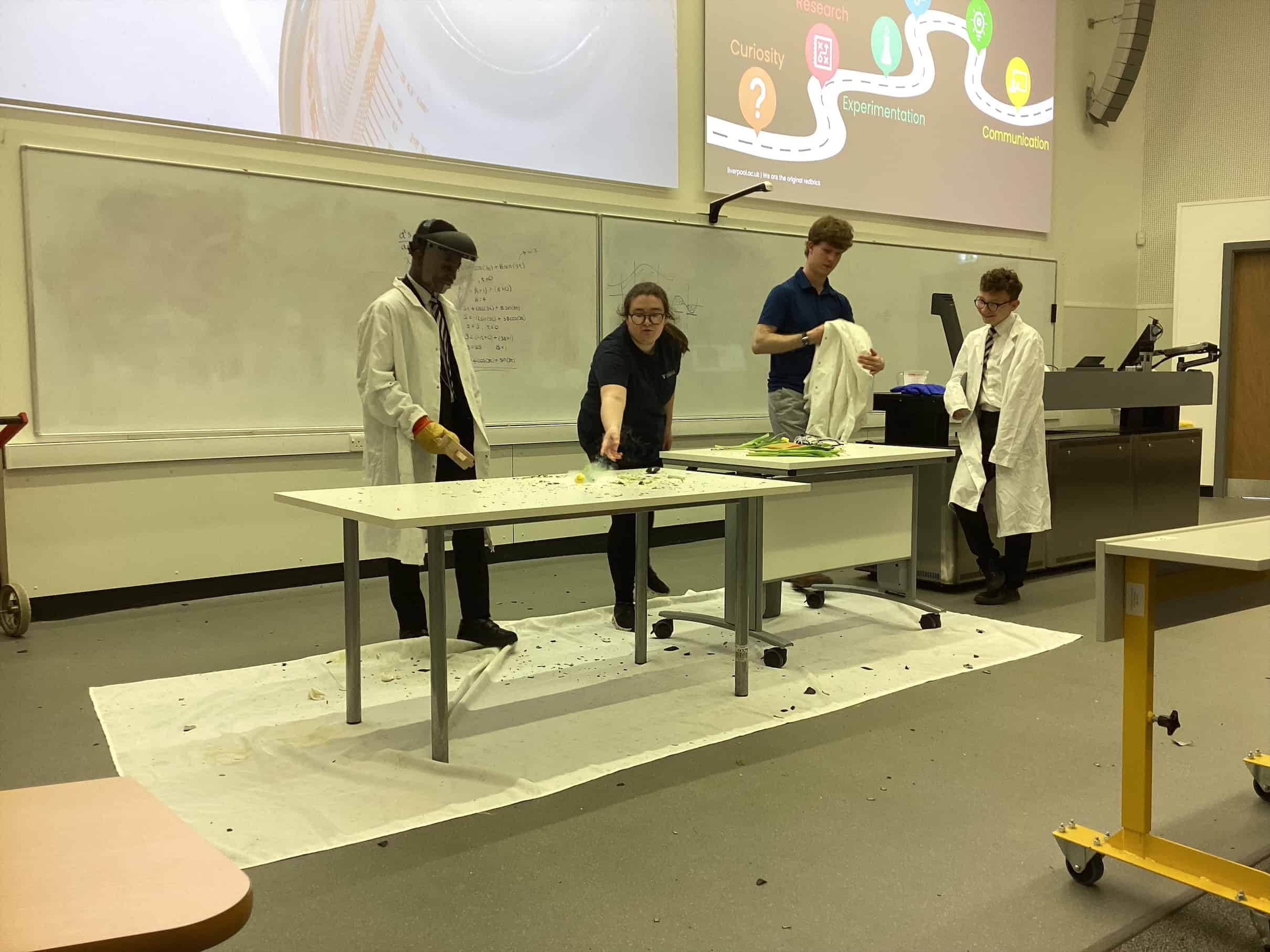 Students from Laurus Ryecroft visit the University of Liverpool and take part in a Science experiment in a lecture hall