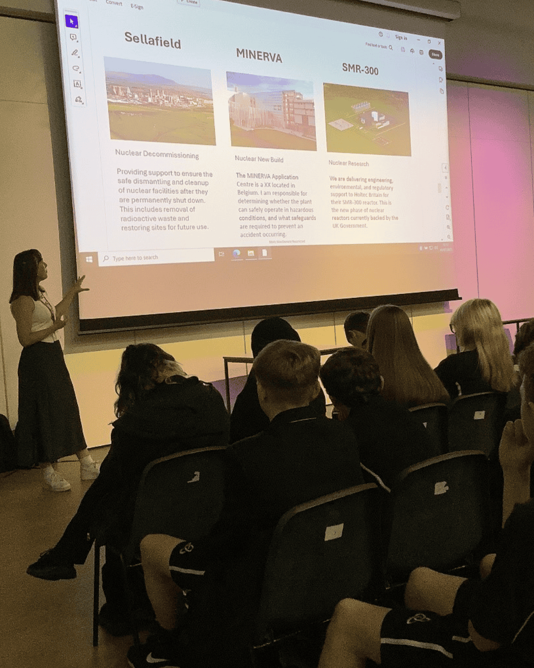 A representative from Mott MacDonald delivers a presentation at Laurus Ryecroft.