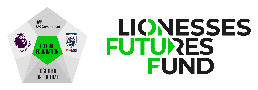 Lionesses Futures Fund header A teacher from Priestnall School guides two students with their work during a lesson.