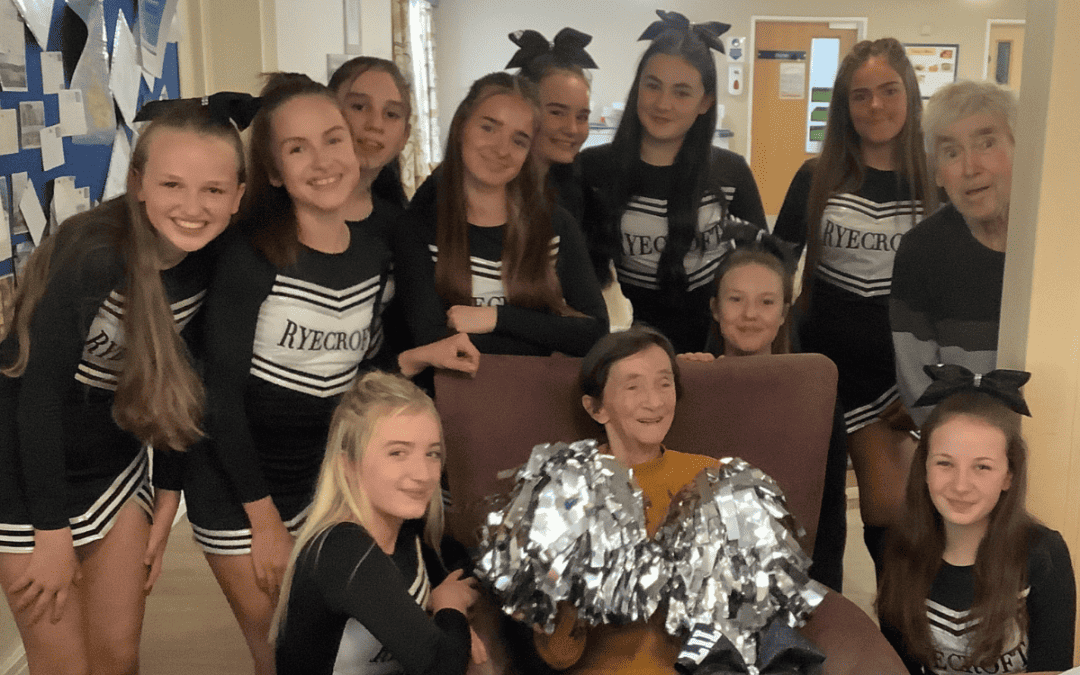 Students spread cheer at local care home